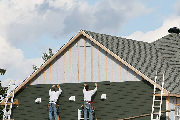 Professional Emergency Siding Repair technician working in Cameron, TX